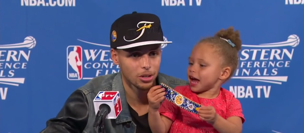 Seth Curry at Post-Game Conference with daughter, Riley.