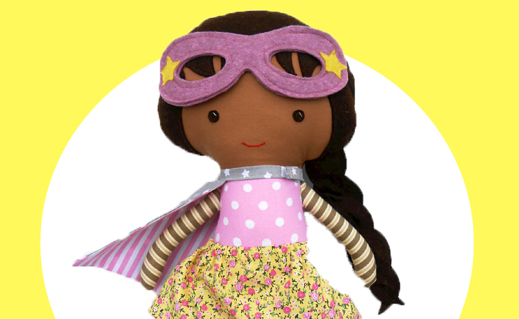 Superhero girl doll on successful black parenting magazine
