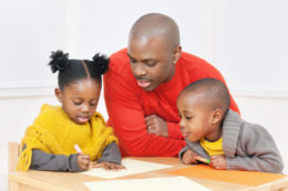 Single dad helps children with homework