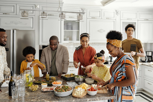 African american family over a typical soul food meal while empowering healthy food choices for kids.